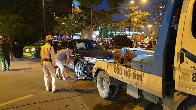 Hà Nội: Danh tính tài xế siêu xe Audi Q5 đâm và lùi liên hoàn, làm gãy chân một người rồi bỏ trốn - Ảnh 8. Hà Nội: Danh tính tài xế siêu xe Audi Q5 đâm và lùi liên hoàn, làm gãy chân một người rồi bỏ trốn - Ảnh 8.