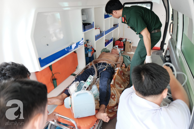 Hai ngư dân gặp nạn ở Trường Sa được đưa về đất liền giữa ảnh hưởng của siêu bão Mangkhut - Ảnh 1.