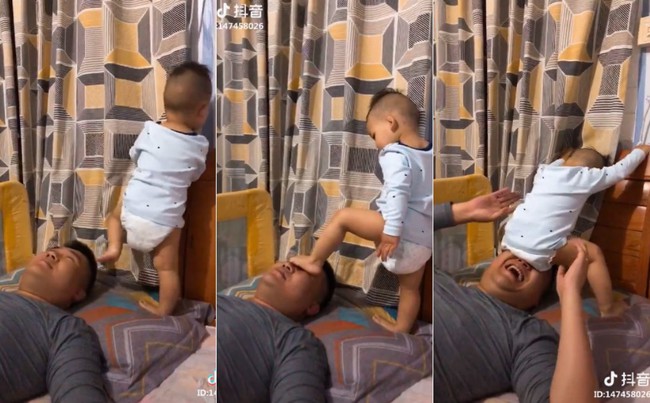 Gọi bố dậy m&atilde;i chẳng được, cậu b&eacute; đ&atilde; &aacute;p dụng tuyệt chi&ecirc;u của ri&ecirc;ng m&igrave;nh khiến bố h&eacute;t ầm rồi tỉnh giấc - Ảnh 2.