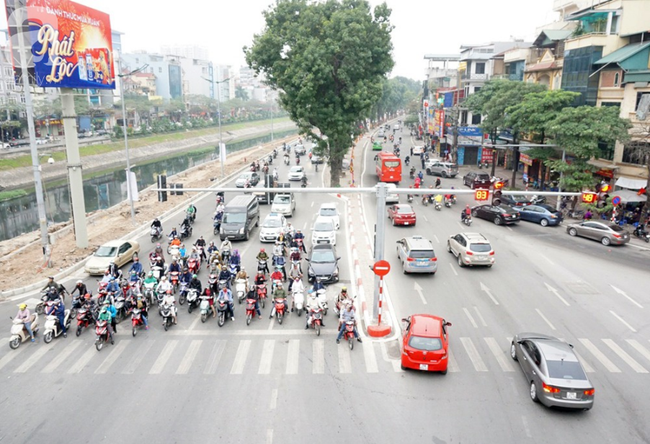 Hà Nội: Mưa phùn trong ngày đi làm đầu năm, giao thông các tuyến đường thông thoáng - Ảnh 8.