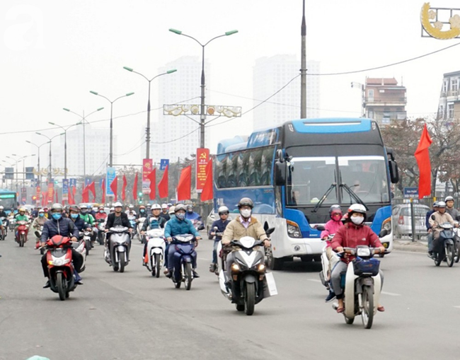 Hà Nội: Mưa phùn trong ngày đi làm đầu năm, giao thông các tuyến đường thông thoáng - Ảnh 14.