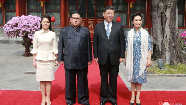 Chiêm ngưỡng 2 bóng hồng được xem là 2 người phụ nữ quyền lực nhất Triều Tiên, luôn theo sát và hỗ trợ đắc lực cho ông Kim Jong-un - Ảnh 12.