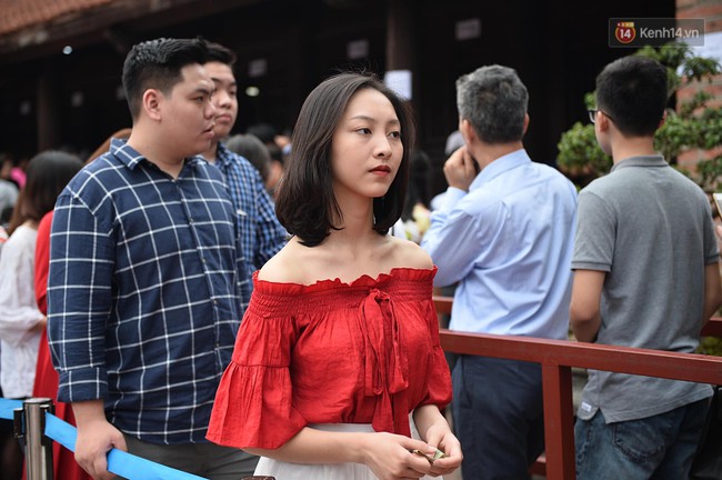 Hà Nội: Người dân đội nắng đi xin chữ đầu năm tại Văn Miếu - Ảnh 11.
