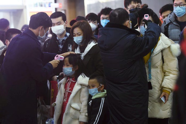 Loạt ảnh cho thấy sức ảnh hưởng của dịch viêm phổi Vũ Hán ở Trung Quốc: Tết Nguyên Đán chỉ cách nhau 1 năm mà khác biệt hoàn toàn - Ảnh 10.