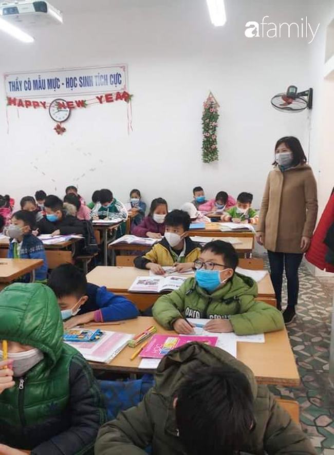 Trước thông tin phát hiện thêm trường hợp nhiễm virus Corona, một trường học ở Hà Nội yêu cầu 100% học sinh đeo khẩu trang đến lớp - Ảnh 1.