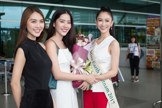 Hoa khôi Nam Em váy trắng giản dị khi đưa Hà Thu đi thi Hoa hậu Trái đất - Ảnh 4.