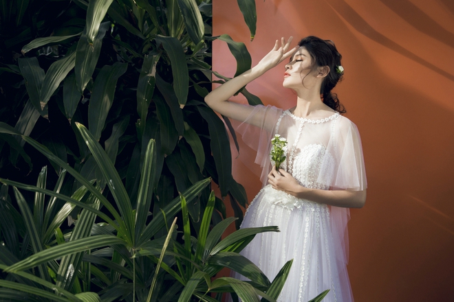 Á hậu Thùy Dung như nàng công chúa yêu kiều trong loạt váy trắng tinh - Ảnh 6.