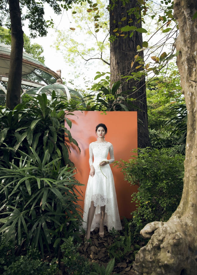 Á hậu Thùy Dung như nàng công chúa yêu kiều trong loạt váy trắng tinh - Ảnh 13.