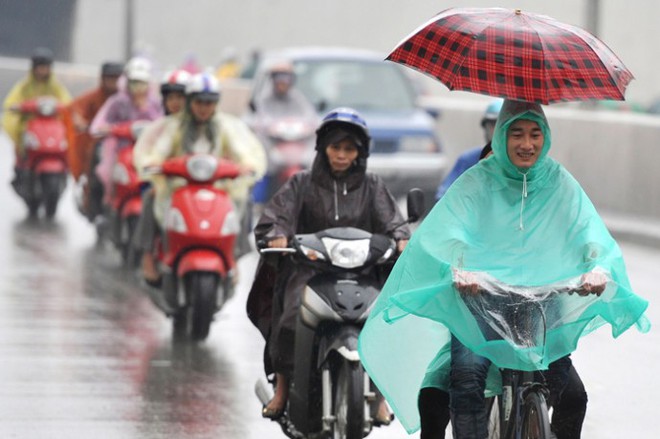 Ngày mai nhiệt độ giảm đột ngột tới 12 độ C, Bắc Bộ cổ vũ đội tuyển U23 Việt Nam trong mưa rét - Ảnh 1.