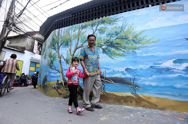Chùm ảnh: Ngắm nhìn những bức tranh đầu tiên ở làng bích họa trong lòng thành phố Đà Nẵng - Ảnh 1.