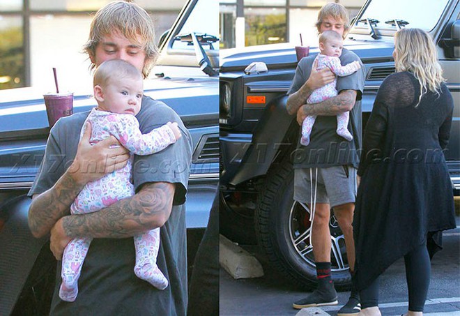 Justin Bieber khéo léo bế em bé trên phố, fan hài hước nhận xét nam ca sĩ đã sẵn sàng để kết hôn và làm bố - Ảnh 2.