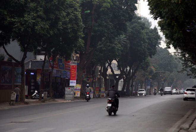 Sáng 29 Tết, nhiều tuyến phố Hà Nội đã vắng bóng người qua lại - Ảnh 11.