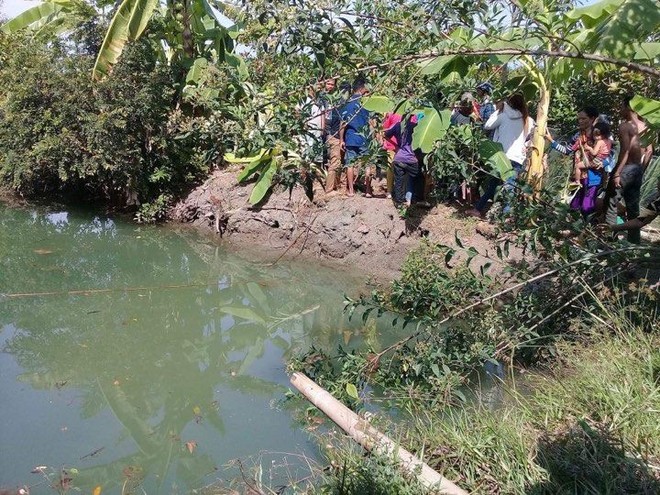 Bố mẹ đi chúc Tết họ hàng, bé trai 7 tuổi ở nhà rơi xuống ao chết đuối - Ảnh 1.