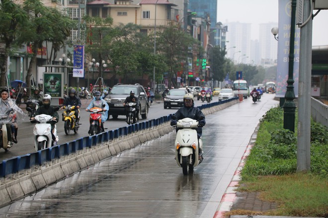 Ngày đi làm đầu tiên năm 2018: Sài Gòn nắng đẹp thông thoáng, Hà Nội mưa phùn ùn ứ nhẹ - Ảnh 30.