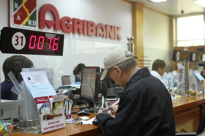 12 khách bị hack thẻ ATM, Agribank mới hoàn tiền được cho 3 người - Ảnh 1.