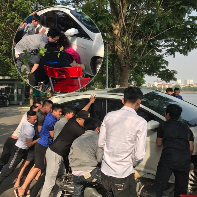 Hà Nội: Hàng chục thanh niên khiêng xe cứu người phụ nữ sau cú mất lái lao lên vỉa hè - Ảnh 10.