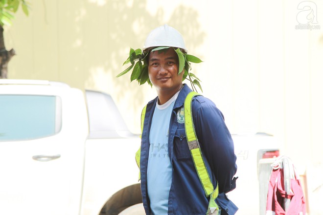 Muôn kiểu chống nắng nóng của người Hà Nội trong những ngày đầu hè - Ảnh 9.