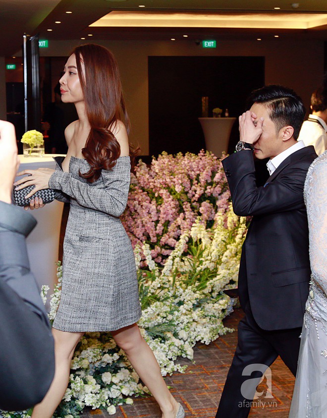 Cường Đô La - Đàm Thu Trang ngại ngần tránh né ống kính phóng viên khi xuất hiện cùng nhau tại đám cưới Diệp Lâm Anh - Ảnh 5.