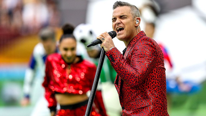 Hãng tin danh giá nhất nhì nước Mỹ lên tiếng xin lỗi vì hành động của Robbie Williamst tại khai mạc World Cup 2018  - Ảnh 1.