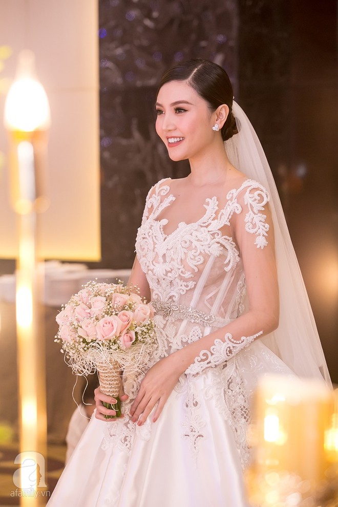 Hoa hậu Ngọc Duyên lộng lẫy trong đám cưới với chồng đại gia tại Hà Nội - Ảnh 12.