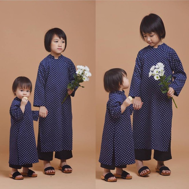 Không chỉ mỗi người lớn, nhiều hãng thiết kế Việt cũng giới thiệu tặng khá nhiều mẫu áo dài cách tân để các bé diện thật xinh xắn trong Tết này - Ảnh 19.