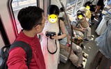 Cảnh nam sinh ngồi bấm điện thoại khi bà bầu đứng suốt 30 phút trên tàu metro số 1 gây tranh cãi dữ dội