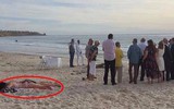 Nằm lì trên bãi biển bất chấp người ta đang làm đám cưới, cô gái phơi nắng bị cư dân mạng lên tiếng chỉ trích