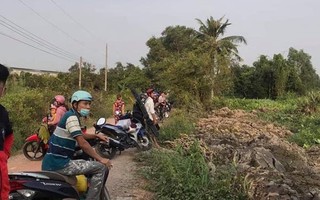 Phát hiện thi thể nữ giới buộc vào can nhựa trôi trên sông