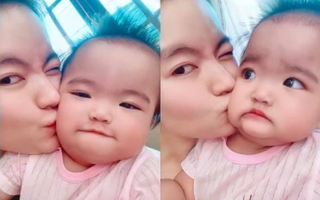 Con gái Mạc Văn Khoa thay đổi biểu cảm liên tục khi được mẹ hôn khiến ai nhìn cũng phì cười
