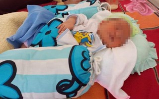 Bé gái sơ sinh bị hai người bịt mặt bỏ rơi trước cổng đền lúc rạng sáng