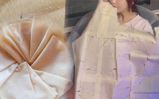 Thưởng thức món ăn vặt tuổi thơ nức tiếng một thời, cô gái lại bị dân tình tưởng nhầm là ăn… giấy