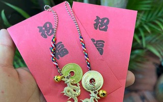 Tiền lì xì đầu năm mới: Khan hiếm mệnh giá thấp, tiền in rồng Tết lên ngôi