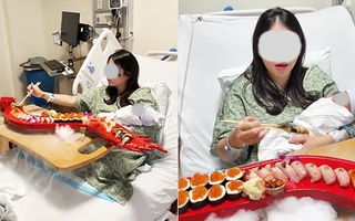 Sản phụ gây tranh cãi dữ dội vì vừa sinh xong đã mukbang sushi ngay trên giường bệnh, ôm con ngồi ăn giữa làn khói mịt mù