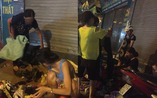 Hà Nội: Người phụ nữ đột nhập shop quần áo "chôm" đồ mang về bán ở vỉa hè bị mời về công an
