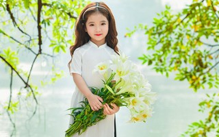 Vẻ đẹp mong manh của cô bé Hà Nội bên hoa loa kèn khiến cư dân mạng thổn thức