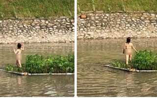 Hà Nội: Cô gái khỏa thân thản nhiên đứng giữa sông Tô Lịch khiến nhiều người tò mò