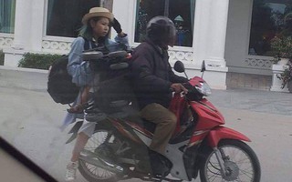 Lại xuất hiện hình ảnh Bella không đội mũ bảo hiểm, ôm con ngồi cồng kềnh sau xe máy khiến dân mạng xôn xao