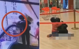 Người mẹ tuột tay làm rơi con 4 tháng tuổi từ thang cuốn và hình ảnh đứa bé còn lại gào khóc khiến ai cũng ám ảnh
