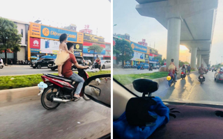 Thót tim cảnh ông bố để con gái nhỏ đứng sau yên xe, không đội mũ bảo hiểm chạy băng băng trên đường