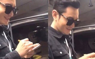 Đây là thái độ của Huỳnh Hiểu Minh khi được yêu cầu ký tên vào hình của Angelababy