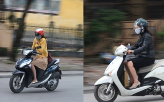 Hà Nội lạnh đột ngột: Kẻ mặc áo cộc, người khoác áo bông