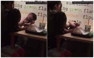 Clip: Người phụ nữ tát, nhét giấy ăn vào miệng bé gái để ngăn bé khóc trong nhà hàng