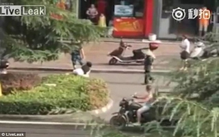 Trung Quốc: cô gái bị túm tóc kéo lê xềnh xệch trên đường quốc lộ, mọi người đi qua ngoảnh mặt làm ngơ