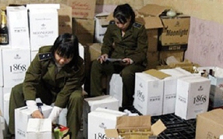 Ém rượu giả chờ Tết