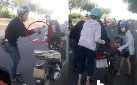 Gặp 2 mẹ con đang loay hoay dắt xe dưới trời nắng gắt, chàng trai có hành động nhanh trí khiến dân mạng thả tim rần rần