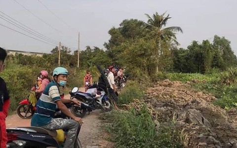 Phát hiện thi thể nữ giới buộc vào can nhựa trôi trên sông