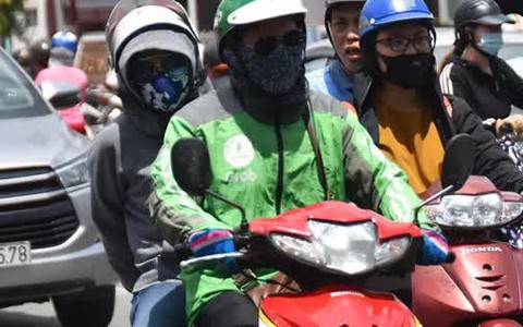 Bộ Công Thương yêu cầu Grab làm rõ việc thu "phụ phí nắng nóng", "mưa lớn", "kẹt xe"...