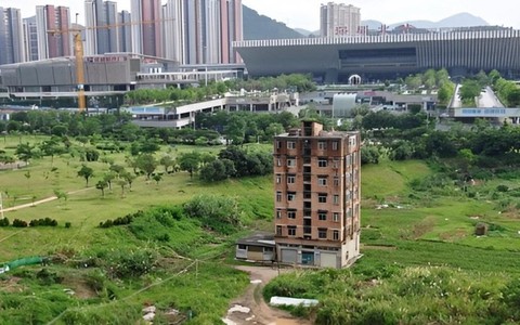 Tòa nhà 7 tầng 1000m2 nằm trên 'vùng đất vàng' không chịu di dời khiến dự án bị lùi đến 7 năm: Từ chối 20 triệu NDT tiền đền bù, chỉ rời đi khi nhận được khoản tiền gấp 6 lần