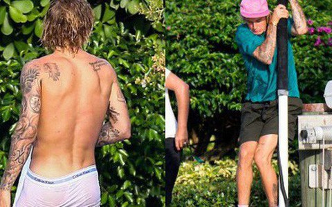 Justin Bieber lộ vòng 3 lấp ló vì mặc nội y xuống hồ bơi, phấn khích chạy nhảy đu cột sau khi đính hôn
