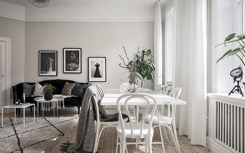 Căn hộ rộng 62m² sử dụng màu trắng là chủ yếu nhưng chẳng hề nhàm chán nhờ cách trang trí có tính thẩm mỹ cao